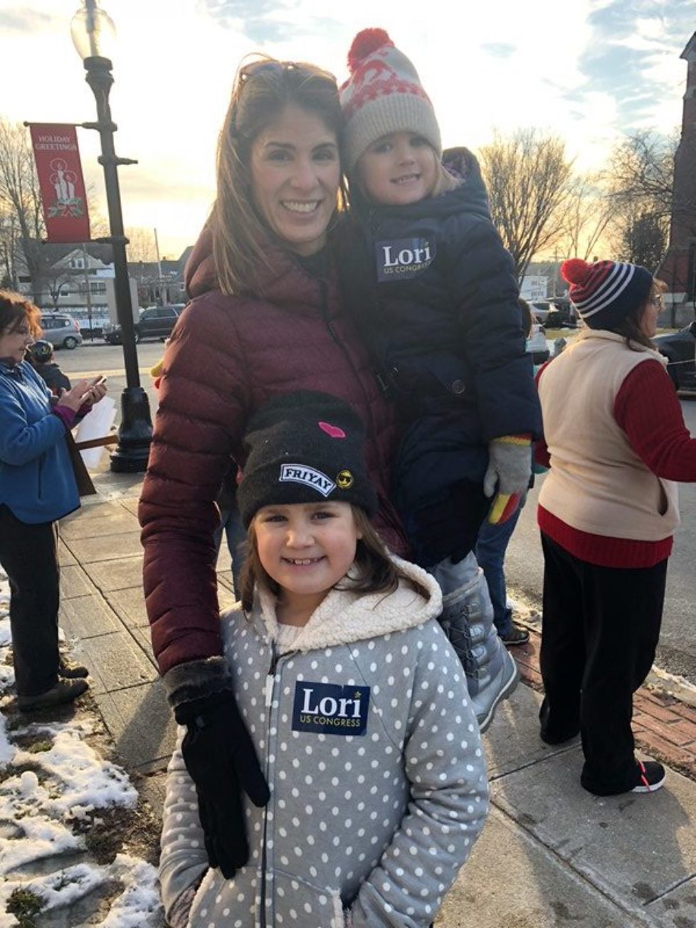 Lori and her daughters march in the 2018 Women's March in Ayer, Massachusetts.